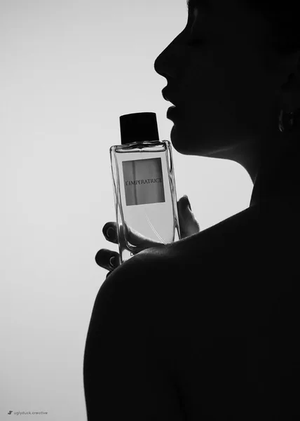 Perfume ad created with Promer AI Ad Clone
